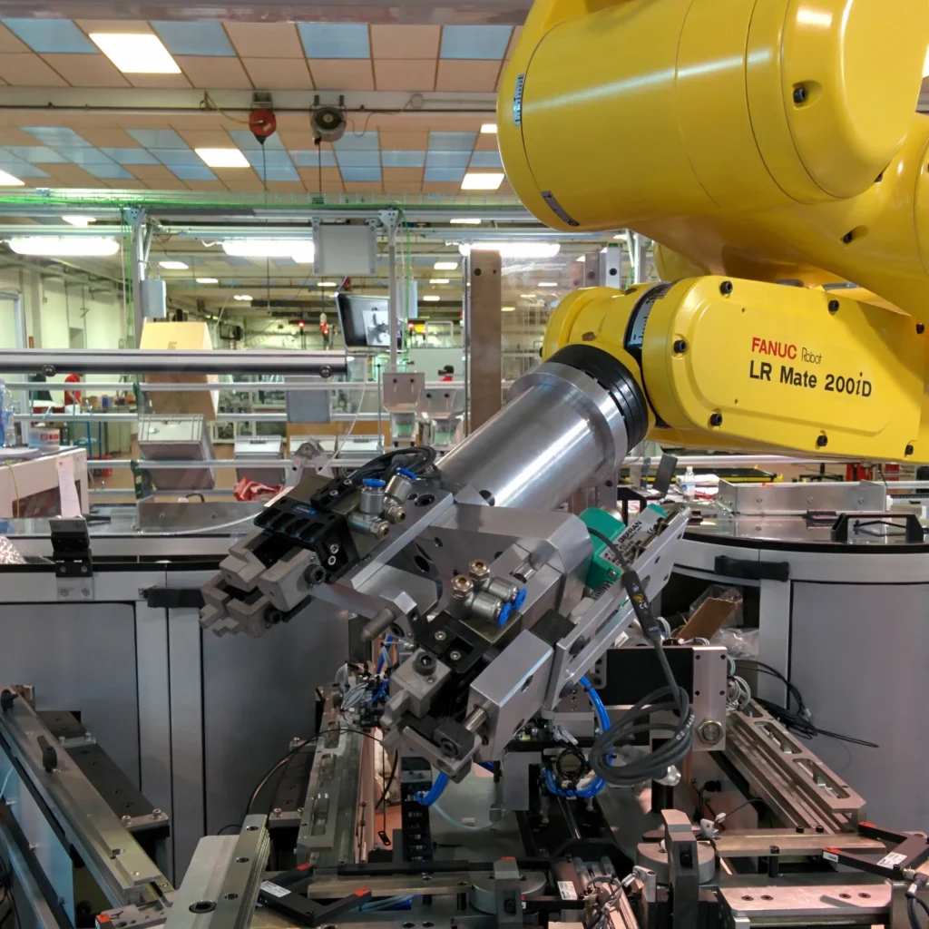 Robot FANUC assemblaggio automatico automotive