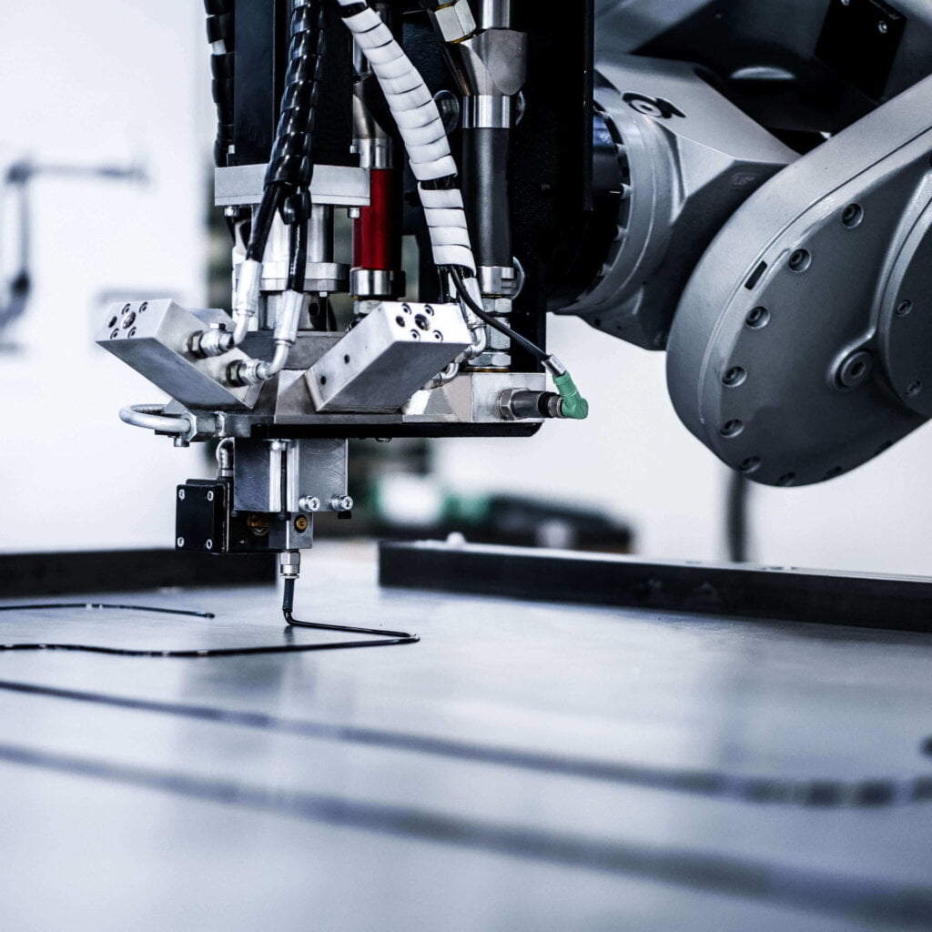 Gasket CAM-robot con tool di erogazione FIPFG in funzione